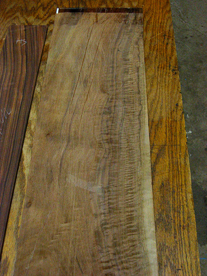 Claro walnut top for a single-cut custom bass