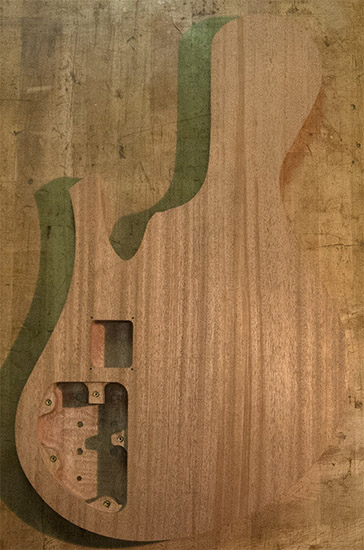 Mahogany bass body with single-cutaway design, back