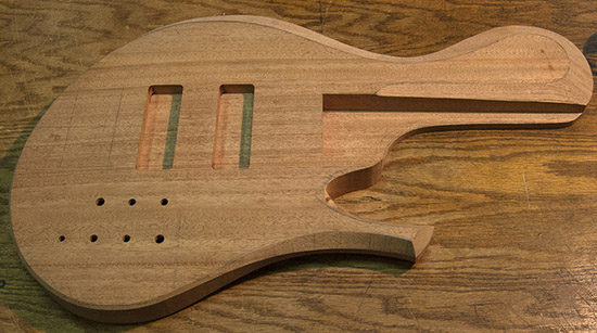 Mahogany single-cut bass body after carving