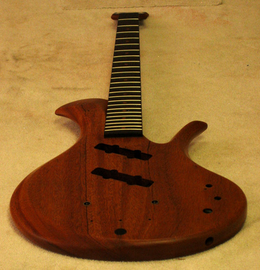 Xylem single-cut mahogany custom bass with oil finish