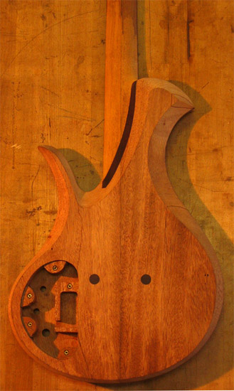 Neck joint on a single cutaway mahogany bass