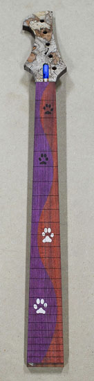 Custom bass neck with dog paw inlays