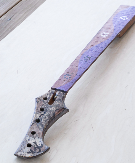 Reverse inline headstock of a 5-string custom bass neck