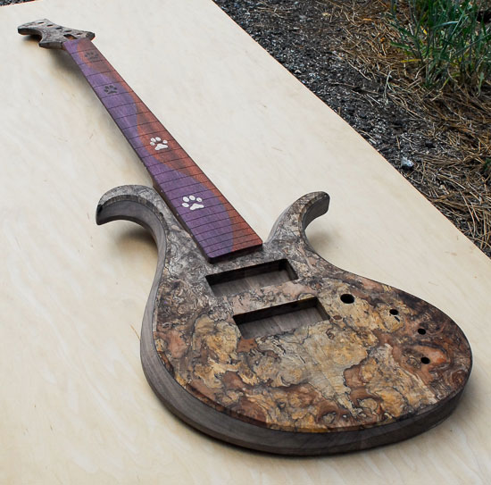 Maple burl tops on a 5-string piccolo bass build