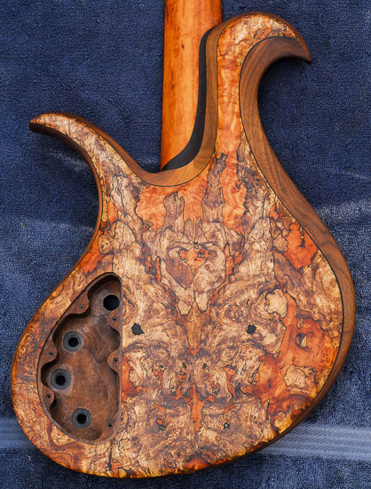Custom bass build made of maple burl, black walnut and tiger wood