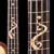 Fretboard inlay of a vine, figured maple in rosewood