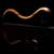 Silhouette of a Xylem 6 string bass with two scrolls
