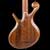 Black walnut top on back of a Xylem fretless bass