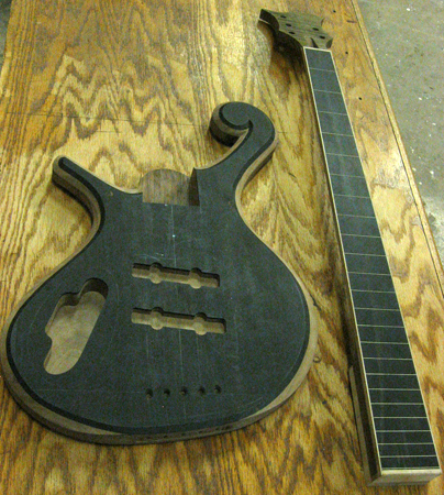 The front of the custom bass neck and body shortly before the neck is glued into the neck pocket