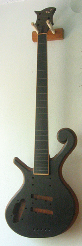 Full shot of the custom bass' front after the first coat of finish was applied