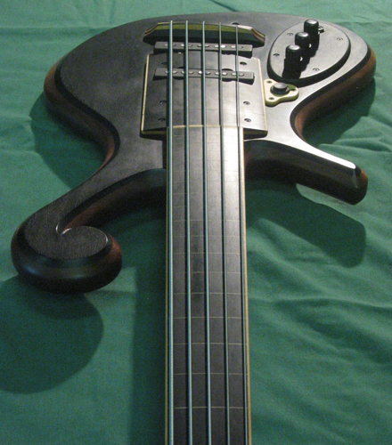 The custom bass viewed from the top down the fretless fingerboard