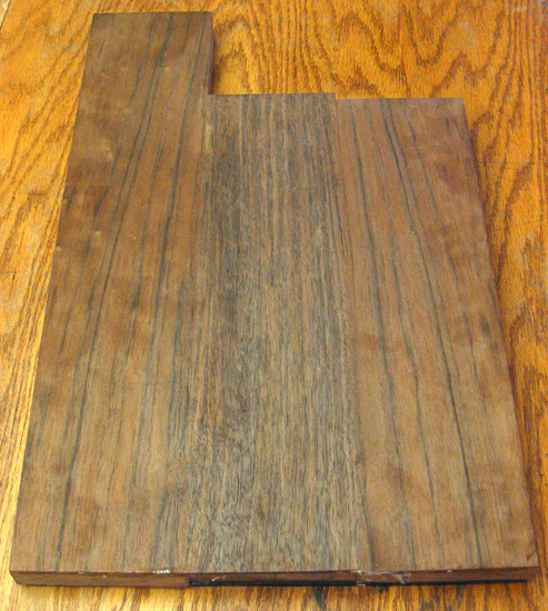 Back of the body blank showing bookmatched black walnut with straight-grained center strip