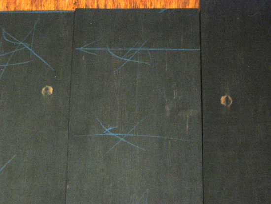 Cat eyes of the bookmatched ebony for the top of the bass' body