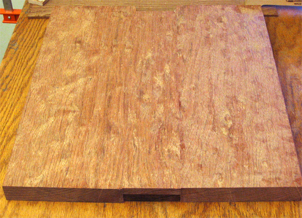 The rough planed guitar body blank from the rear showing the figure of the brazilian cherry