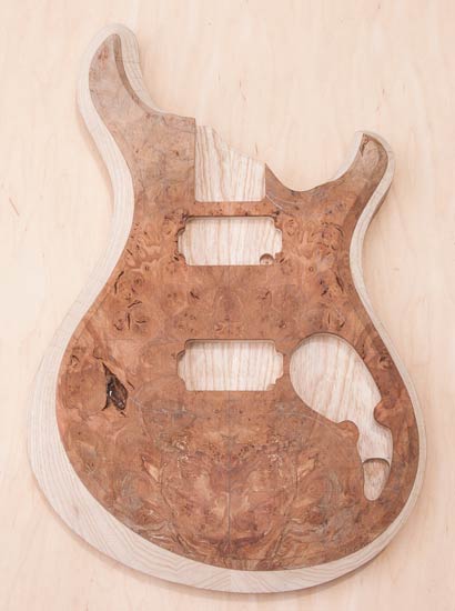 Swamp ash custom guitar body with burl topwood