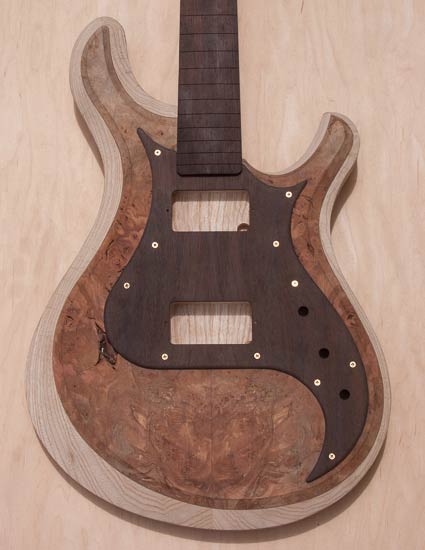 Electric guitar with wenge pickup and fretboard