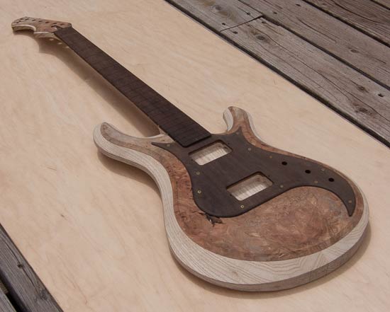 Xylem guitar with carved arm bevel, swamp ash body