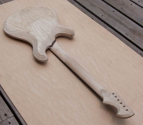 Custom guitar with reverse-inline headstock