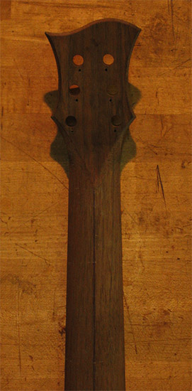 Custom guitar neck with black walnut veneer on back
