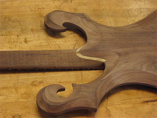 Custom guitar neck heel with black walnut neck