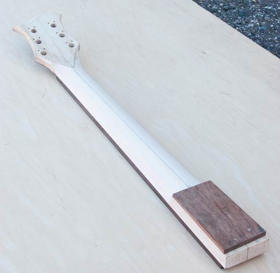 Electric guitar neck during the build process