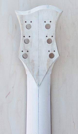 Xylem headstock with ash veneer