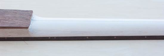 Maple neck with wenge binding, carved profile