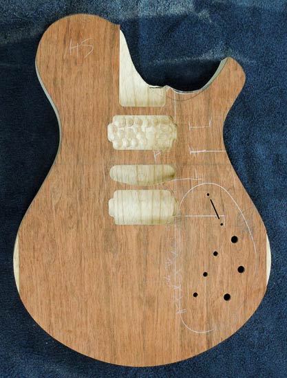 Guitar body with three routes for Fishman Fluence pickups