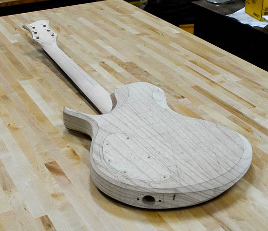 Output jack on a swamp ash custom guitar build
