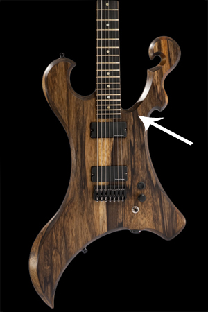 Deep cutaway on a 7 string custom guitar, allowing higher frets to be played with ease