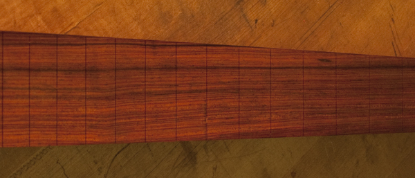 Quarter sawn cocobolo fretboard with fret slots